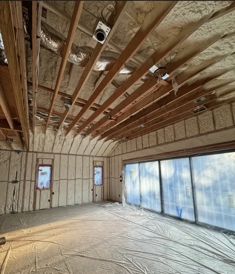 Interior walls and ceiling insulated with spray foam during new construction in Giddings